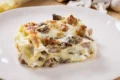 LASAGNE FUNGHI E SALSICCIA